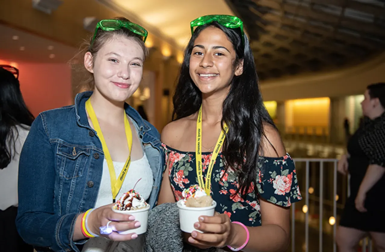 Two students holding ice cream