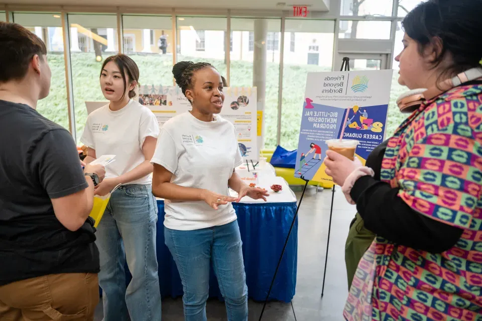 Two students discuss their project